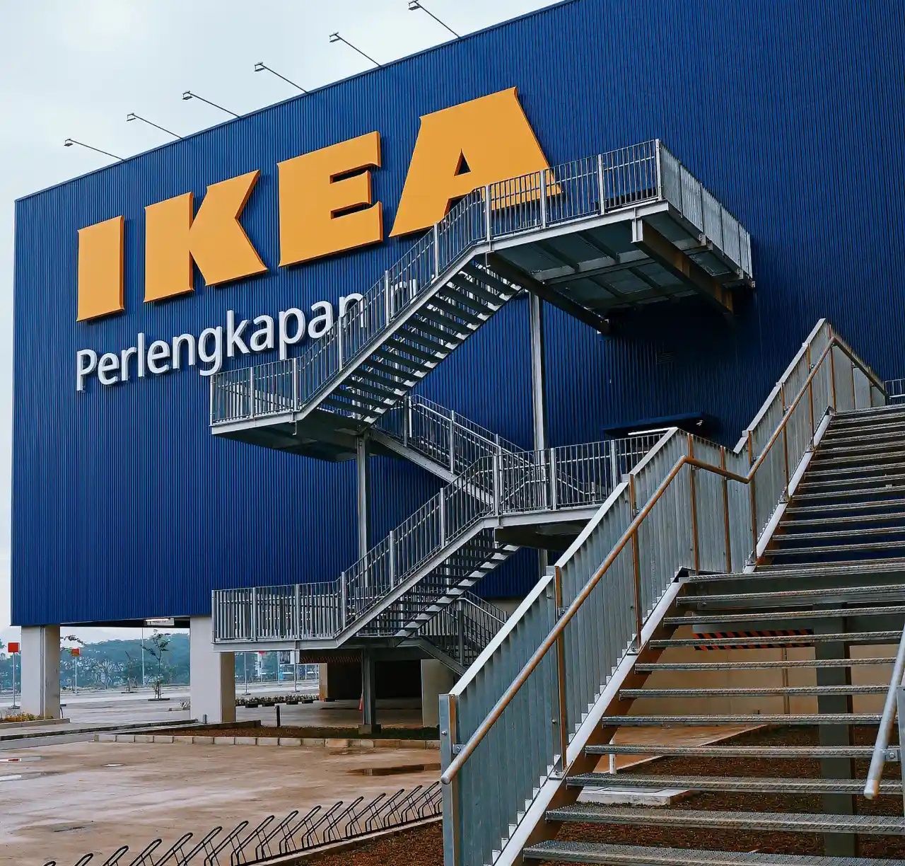 Large building with blue walls and a large IKEA logo